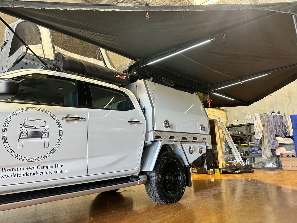 Defender Adventure Family Plus Camper 270-degree-awning open